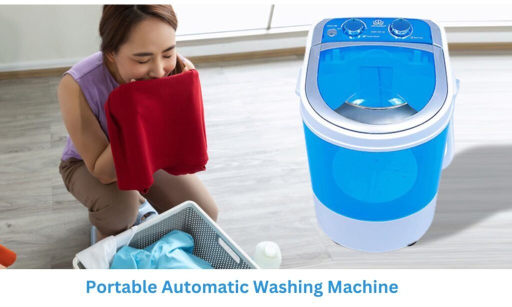 Smiling woman using a compact Hitachi portable automatic washing machine in a modern apartment.