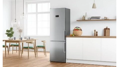 Double door refrigerator with a sleek stainless steel exterior, featuring two spacious compartments for cooling and freezing, adjustable shelves, and energy-efficient LED lighting.