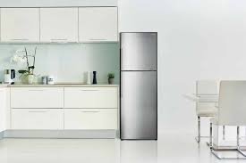 Sharp double door refrigerator with a modern design, featuring stainless steel finish and spacious interior compartments.